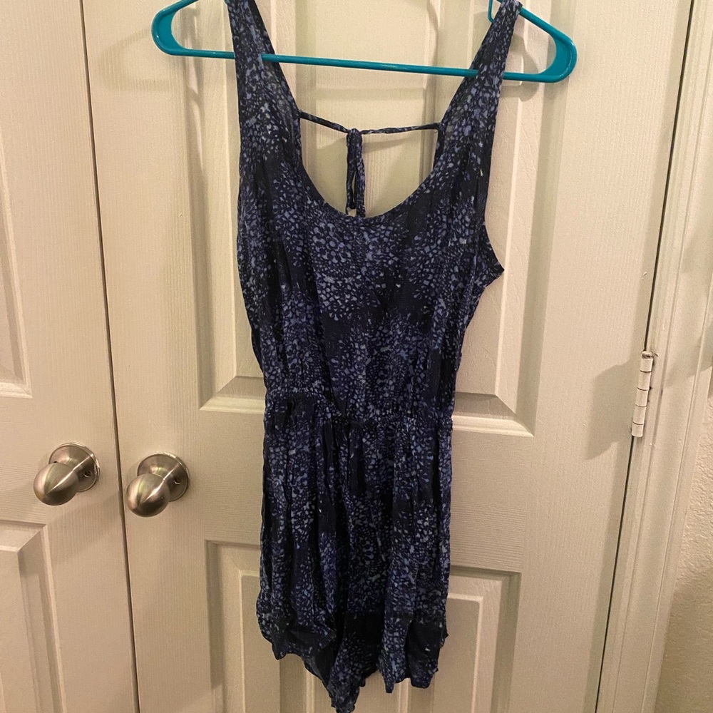 Dark and light blue romper with open back